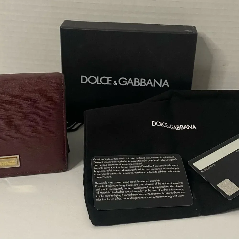 Dolce & Gabbana  burgundy 2 fold wallet with change section signature on front